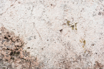 Wall fragment with scratches and cracks