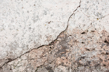 Wall fragment with scratches and cracks