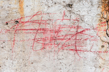 Wall fragment with scratches and cracks