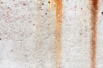 Wall fragment with scratches and cracks