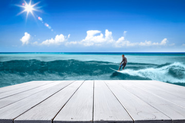 Summer table background of free space and surfer on waves. 