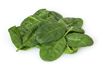 Heap of spinach leafs isolated on white background