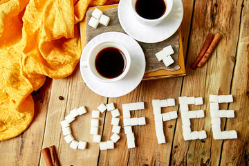 Symbolic image. Text of cube sugar. Sign coffee.