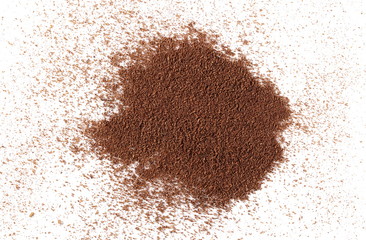 Cinnamon powder pile isolated on white background