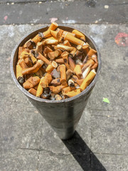 Cigarette butt disposal unit