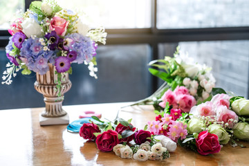 Arranging artificial flowers vest decoration at home, making organizing diy artificial flower, craft and hand made concept