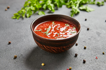 Satsebeli tomato ketchup sauce and paste with red hot chilly pepper, cilantro, garlic, vinegar,...
