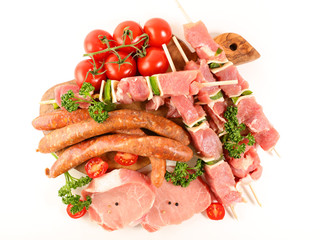 assorted raw meats isolated on white background