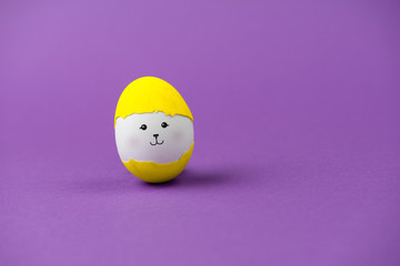 Fototapeta premium Broken shell cover a whole egg. Creative shift concept.