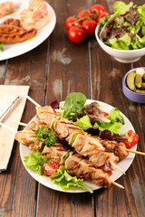 skewer meat and salad