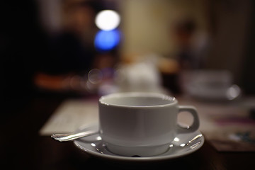 English tea in a cafe / cup and kettle with five o'clock tea