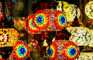 Turkish market, Arabic souvenir shop, oriental stain glass lamps background.