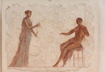 Ancient roman fresco showing a couple