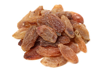 green raisin stacked together on white background