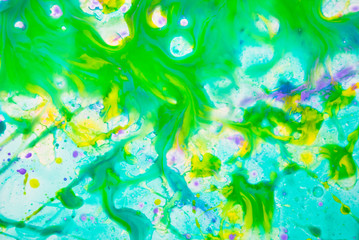Fototapeta na wymiar Aquarelle abstract background. Fluid art green psychedelic pattern.