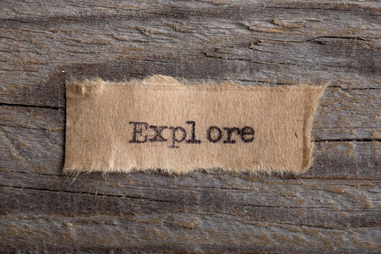 The Word Explore Typed On A Piece Of Paper. Concept For Education, Improve And Uncover New Opportunities.