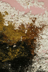 Abstract colorful powder background, close up view of mixed powders, design element