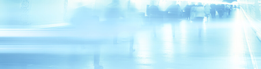blurred background walking people crowd legs / gray background movement traffic abstract people...
