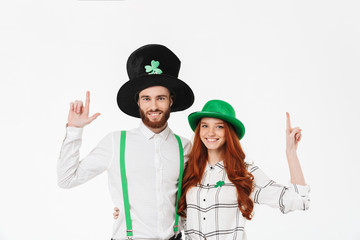 Happy young couple wearing costumes, celebrating