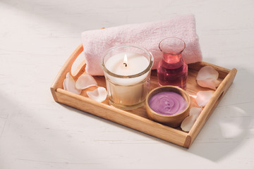 Spa and aromatherapy. Rose flower and essential oil.