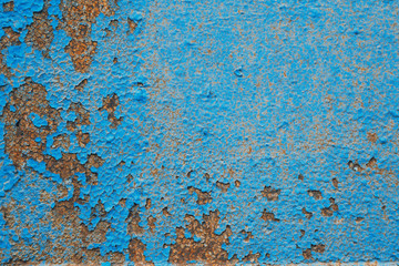 Old Painted Blue Wall. Background. Cracked Flaked Shabby Wall With Rundown Stucco Layer Texture.