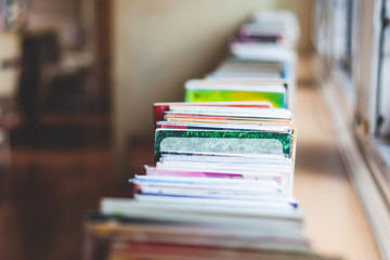 Book in the library room and blurred bookshelf. Back to school concept. library room.