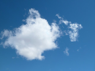 Blue sky with white clouds. Beautiful sky background. Clear day and good weather.              