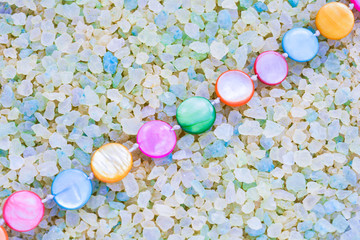 Colorful Pearl Beads on Crystals of Aromatic Bath Sea Salt for Spa