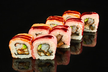 Tasty sushi roll  isolated on black background for menu. Japanese food