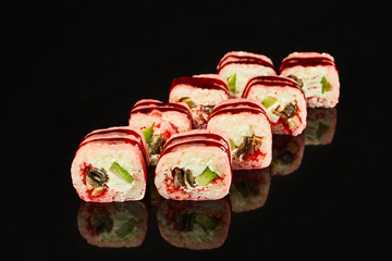 Tasty sushi roll  isolated on black background for menu. Japanese food