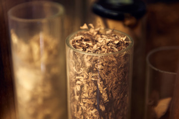 Old bottles with herbs and medicines in the pharmacy
