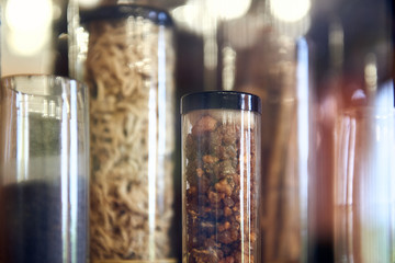 Old bottles with herbs and medicines in the pharmacy
