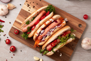 Hot dog with vegetables