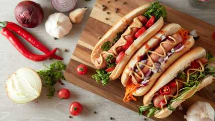 Hot dog with vegetables