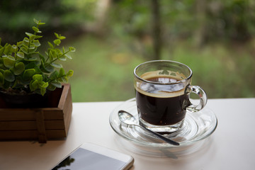 A cup of hot coffee in coffe shop