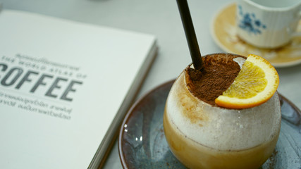 Orange Cappuccino on the table