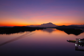Scenery of beautiful sunrise with river and mountain in Borneo Asia