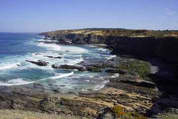 Cliffs, waves and the rock formations in the water, Rota Vicentina, Alentejo, Portugal
