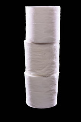 Vertical column of three rolls of a white toilet paper