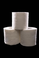 Three rolls of a white toilet paper