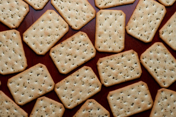 Crackers on wooden table