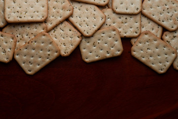 Crackers on wooden table