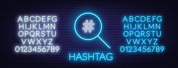Neon hashtag search sign on brick wall background. Neon alphabet. Vector illustration.