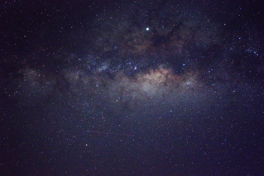 Clearly milky way galaxy rising in Borneo Asia, background of beautiful milky way. Long exposure photograph with grain. Image contain certain grain or noise and soft focus.