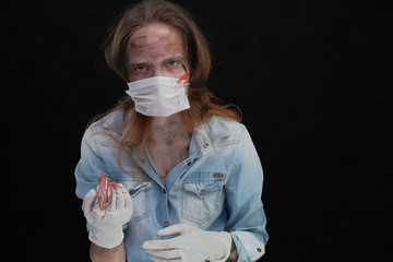 Concept portrait of a hellish and terrible nurse, ready to operate on you right here, in this mud...