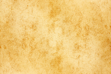 Yellow brown stained paper. Rustic grunge parchment. Empty copy space antique secret message background.