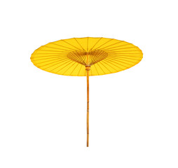 Colorful big yellow fabric umbrella with long wood handle isolated on white background with clipping path