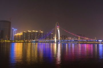 Fototapeta premium the Pearl River with Liede Bridge illuminated at night in Guangzhou, China