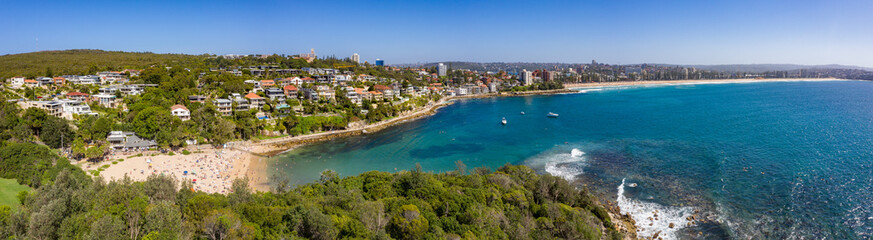 Fototapeta na wymiar Panoramic view of Shelley Beach and Manly beach on a busy summer afternoon in Sydney Australia