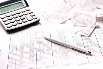 Naklejka na ściany i meble Accountant work table with calculator, charts and pen.